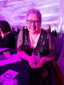 Above: Sarah Laker and the award for Campaign of the Year.